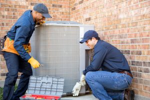 Chicago AC Repair Specialist AC technician performing air conditioning repair in Chicago